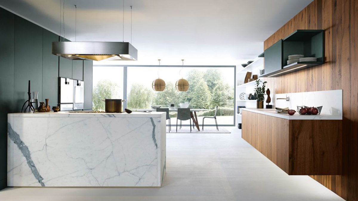 next125 küche mit küchenblock aus marmor und fronten aus holz und mattgrün