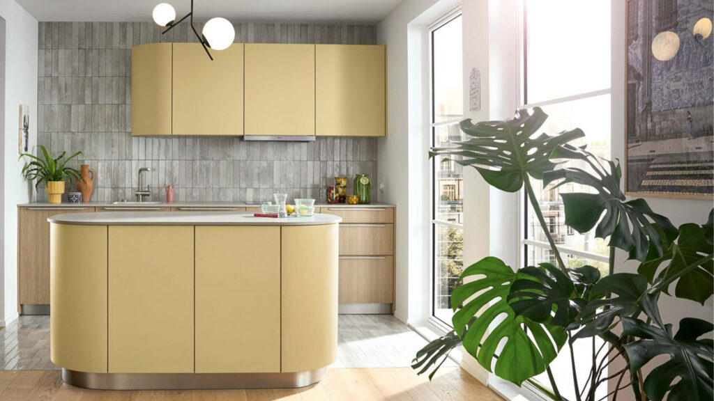 schüller küche mit kochinsel rund in gold gelb