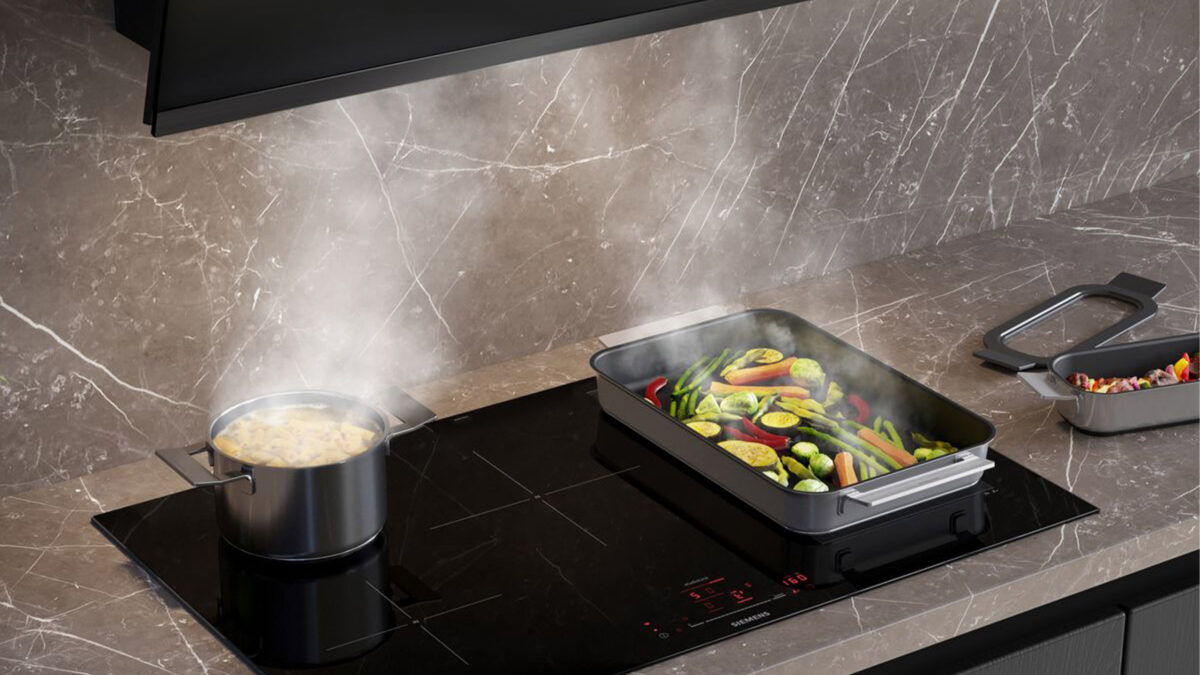 topf und bräter mit gemüse auf einem siemens kochfeld